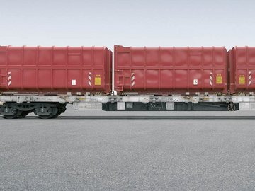 Roter Intermodalwagen mit drei Elementen auf grauem Untergrund.